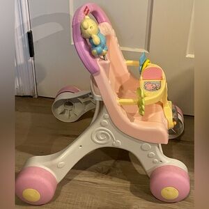 Fisher-Price Brilliant Basics Stroll Along Musical Doll Stroller Walker Push Toy